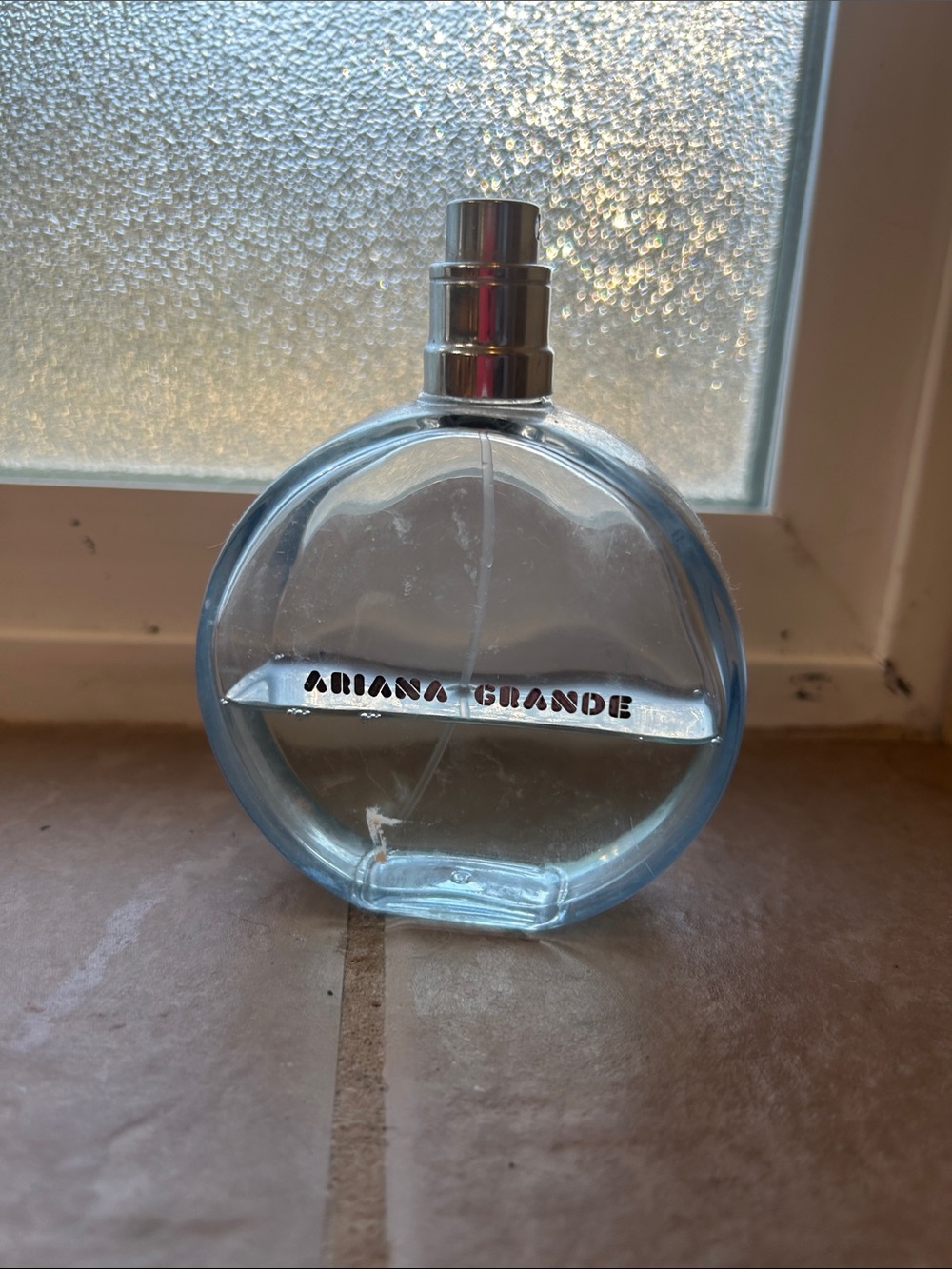 Ariana Grande Pale Blue Round Glass Accent Bottle